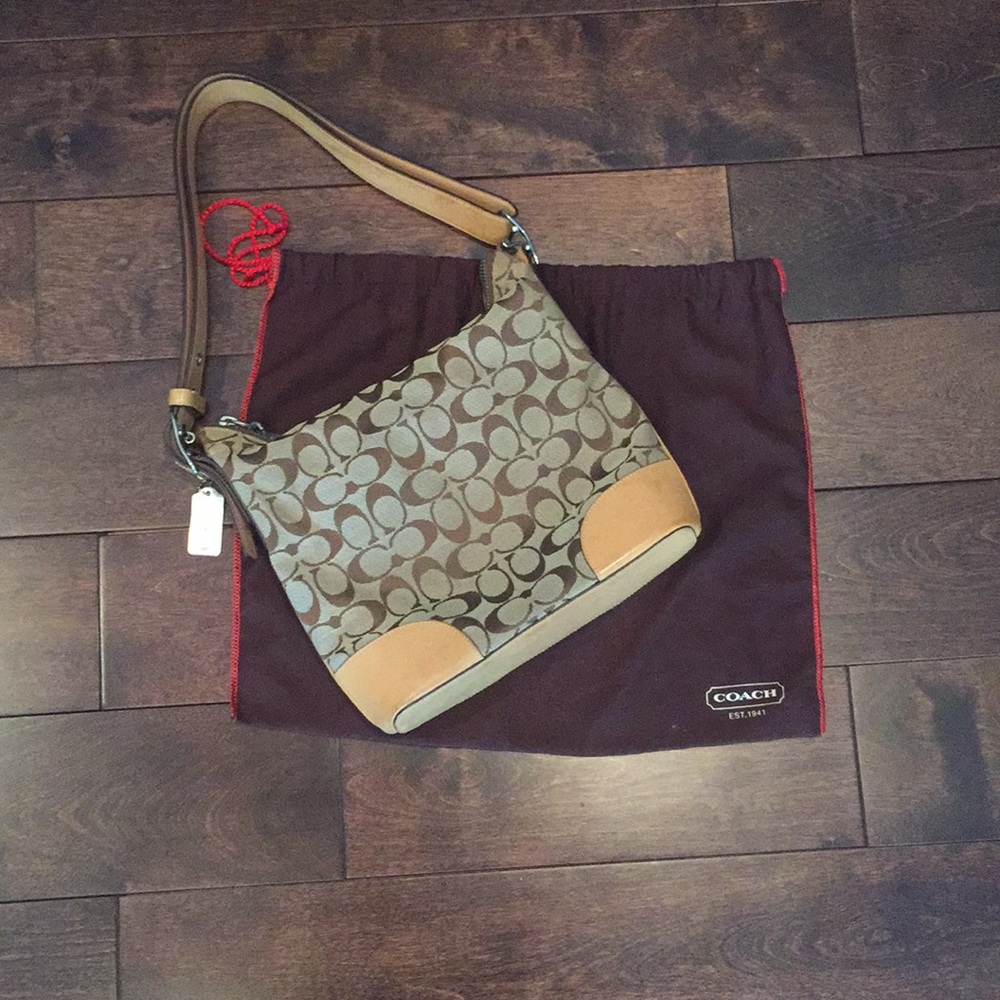 COACH shoulder bag with signature logo.